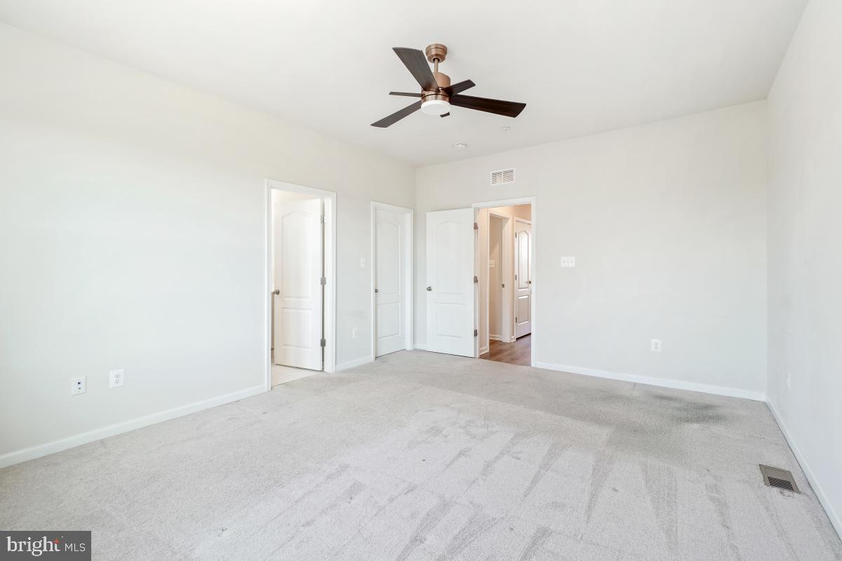 5820 Imperial Drive Frederick, MD 21703 - Photo 24 of 30 a view of empty room with ceiling fan