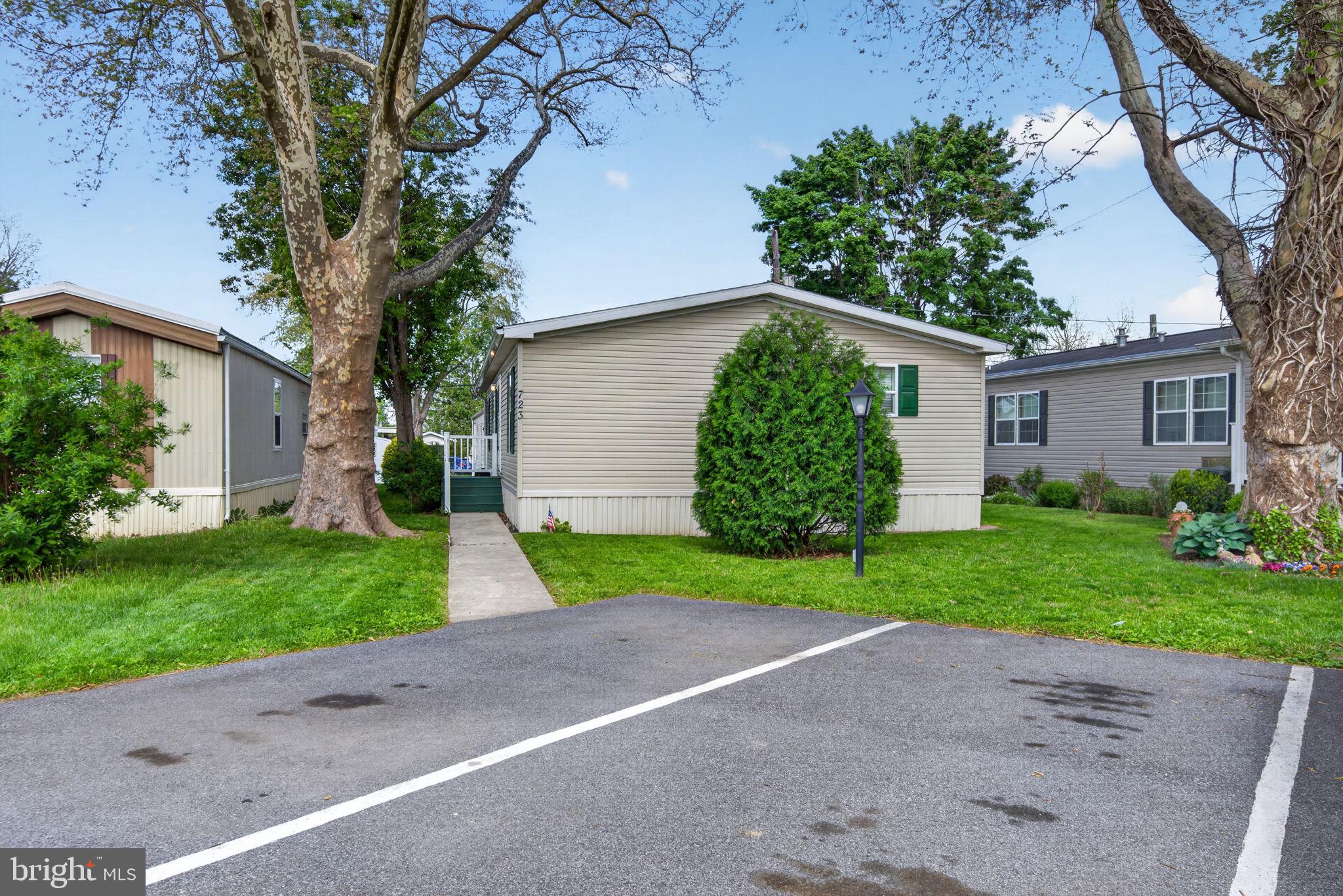 723 Sherry Lane Lancaster, PA 17601 - Photo 2 of 24 a front view of house with yard and green space
