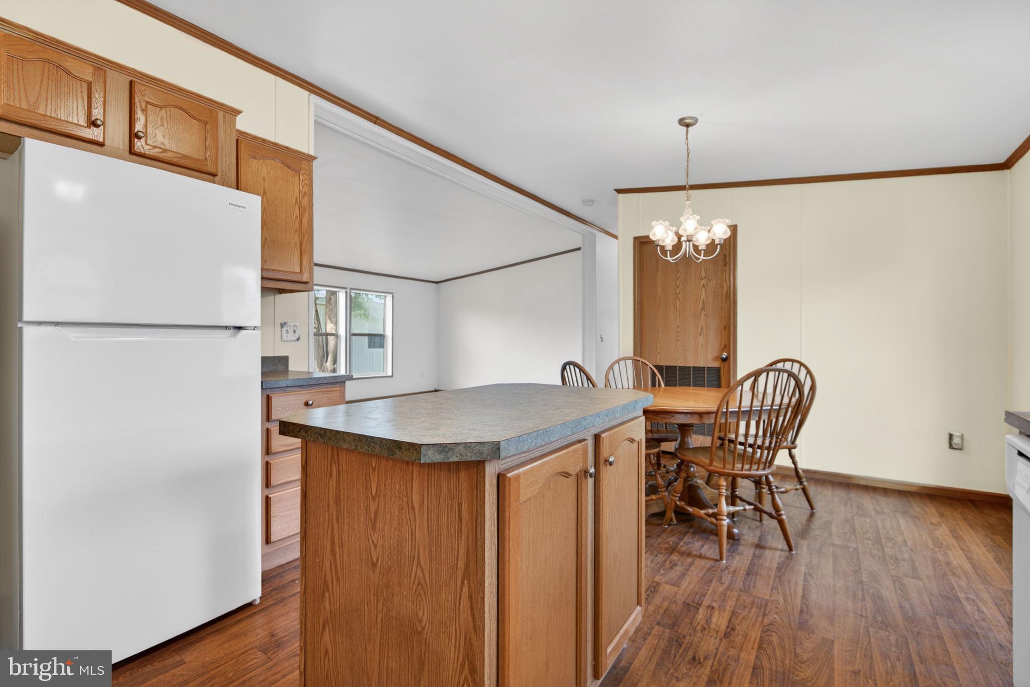 723 Sherry Lane Lancaster, PA 17601 - Photo 10 of 24 a dining room with furniture and wooden floor