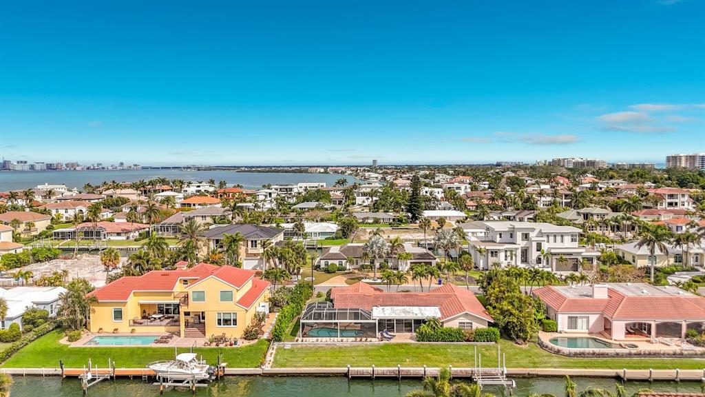 581 Yardarm Lane Longboat Key, FL 34228 - Photo 29 of 30 an aerial view of residential houses with outdoor space