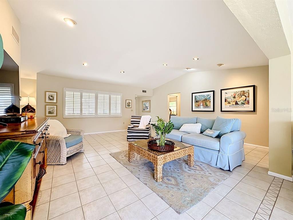 581 Yardarm Lane Longboat Key, FL 34228 - Photo 5 of 30 a living room with furniture and a couch