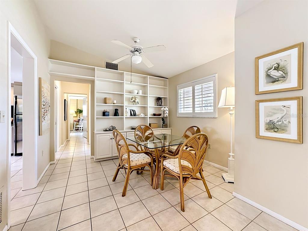 581 Yardarm Lane Longboat Key, FL 34228 - Photo 6 of 30 a dining room with furniture and window