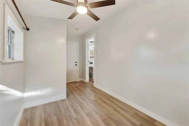 a view of a balcony with wooden floor
