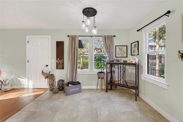 a kitchen with stainless steel appliances granite countertop a stove and a refrigerator