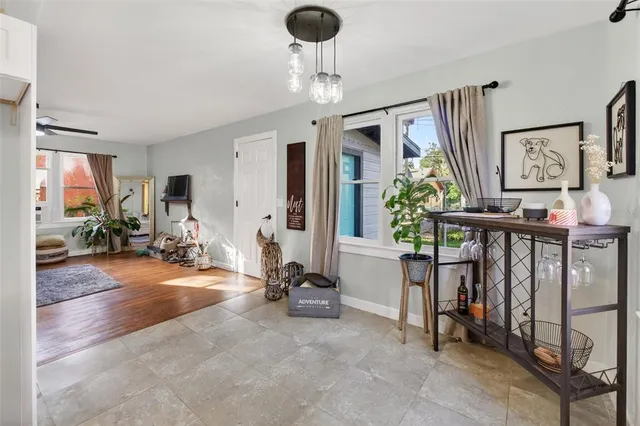 a view of room with window and ceiling fan