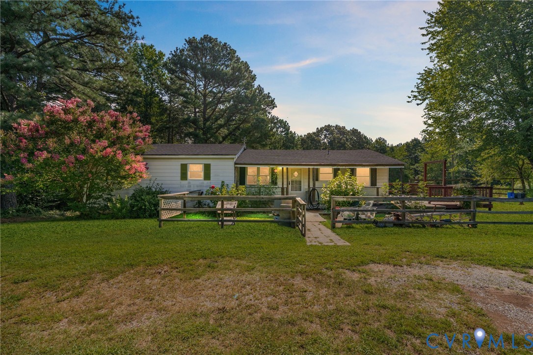 3490 Willow Brook Road Bumpass, VA 23024 - Photo 1 of 47 a view of a house with backyard porch and sitting area