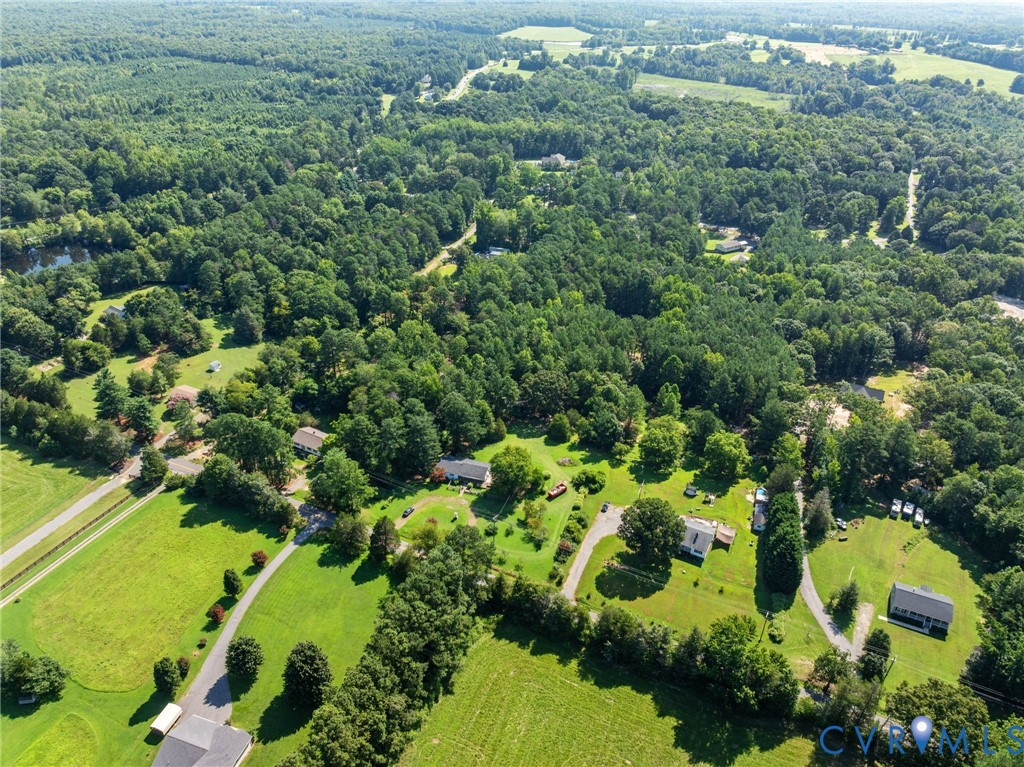 3490 Willow Brook Road Bumpass, VA 23024 - Photo 15 of 47 an aerial view of residential houses with outdoor space and trees all around