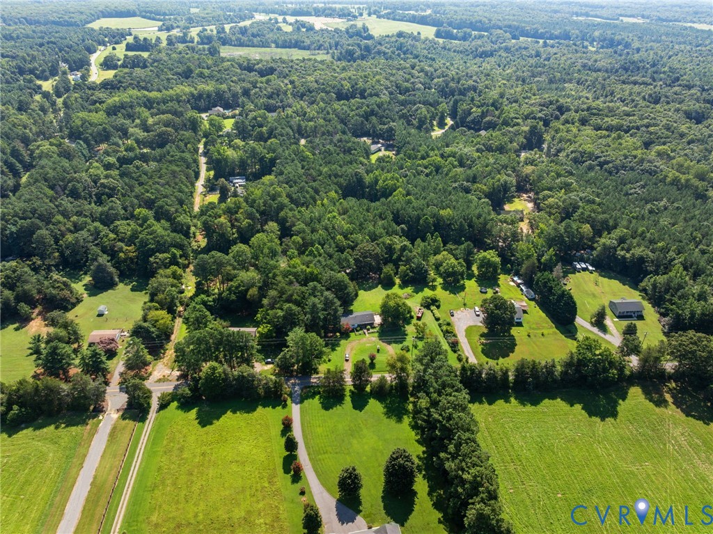 3490 Willow Brook Road Bumpass, VA 23024 - Photo 16 of 47 an aerial view of residential houses with outdoor space and trees all around