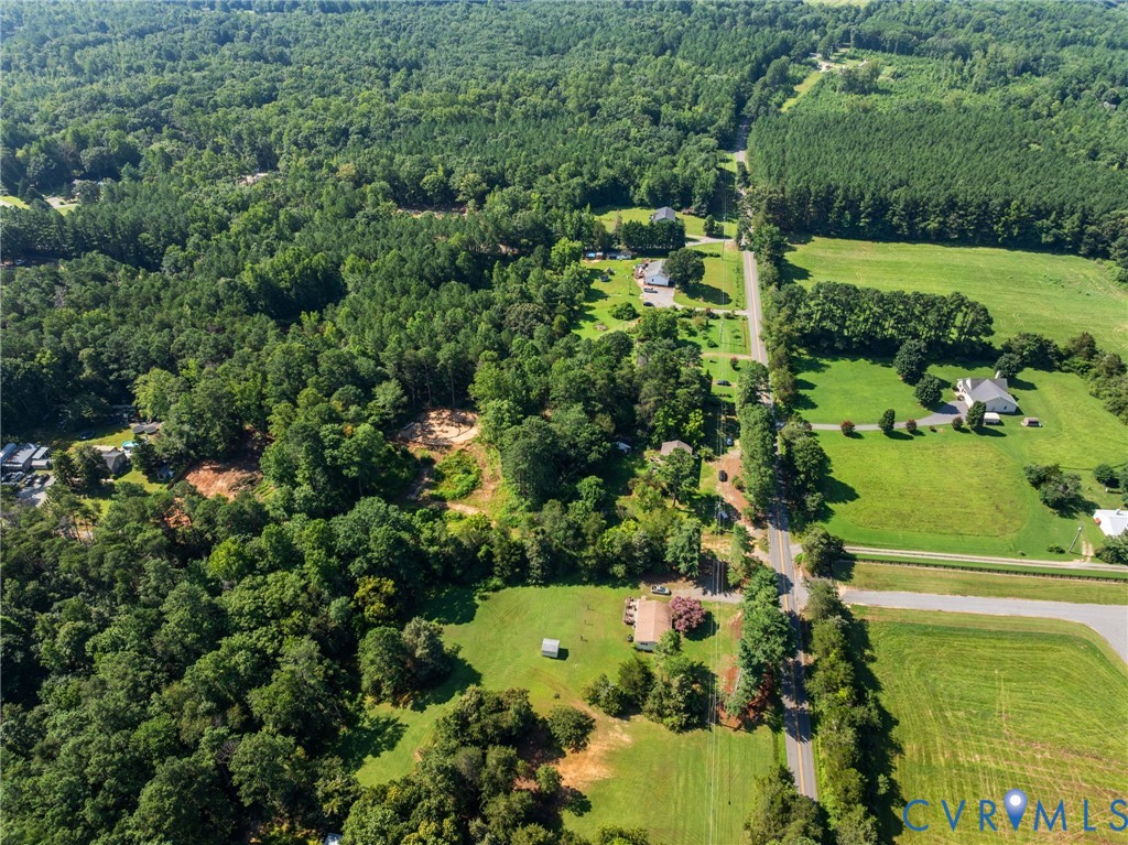 3490 Willow Brook Road Bumpass, VA 23024 - Photo 19 of 47 an aerial view of a residential houses with outdoor space and trees all around