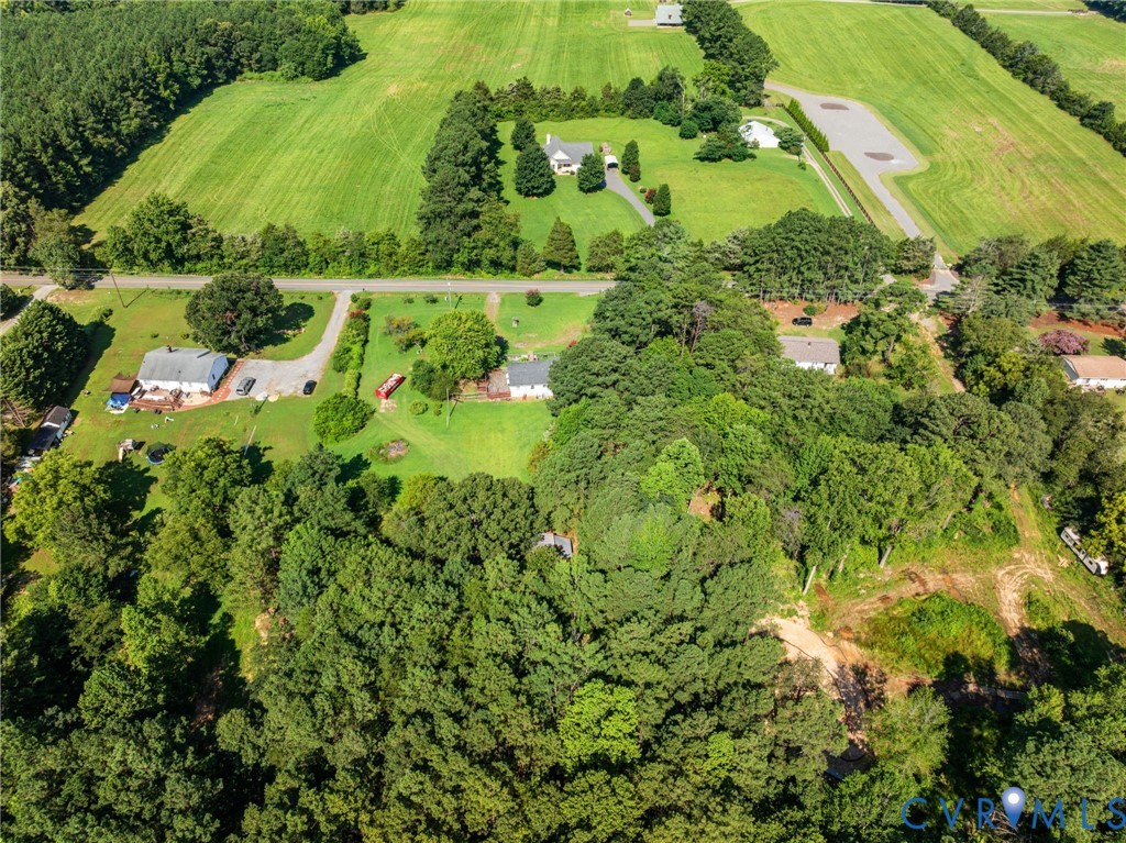 3490 Willow Brook Road Bumpass, VA 23024 - Photo 24 of 47 a view of a garden with a lake
