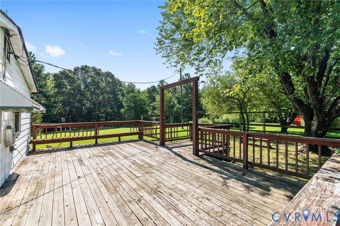3490 Willow Brook Road Bumpass, VA 23024 - Photo 33 of 47 a view of wooden deck with a yard