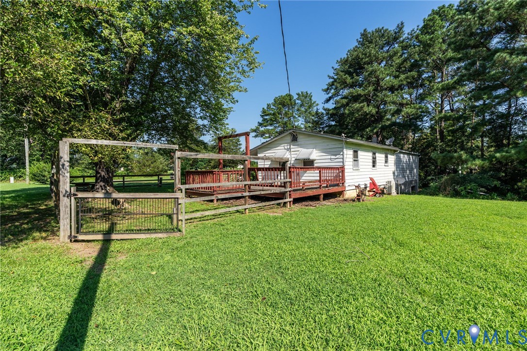 3490 Willow Brook Road Bumpass, VA 23024 - Photo 34 of 47 a view of a house with a backyard