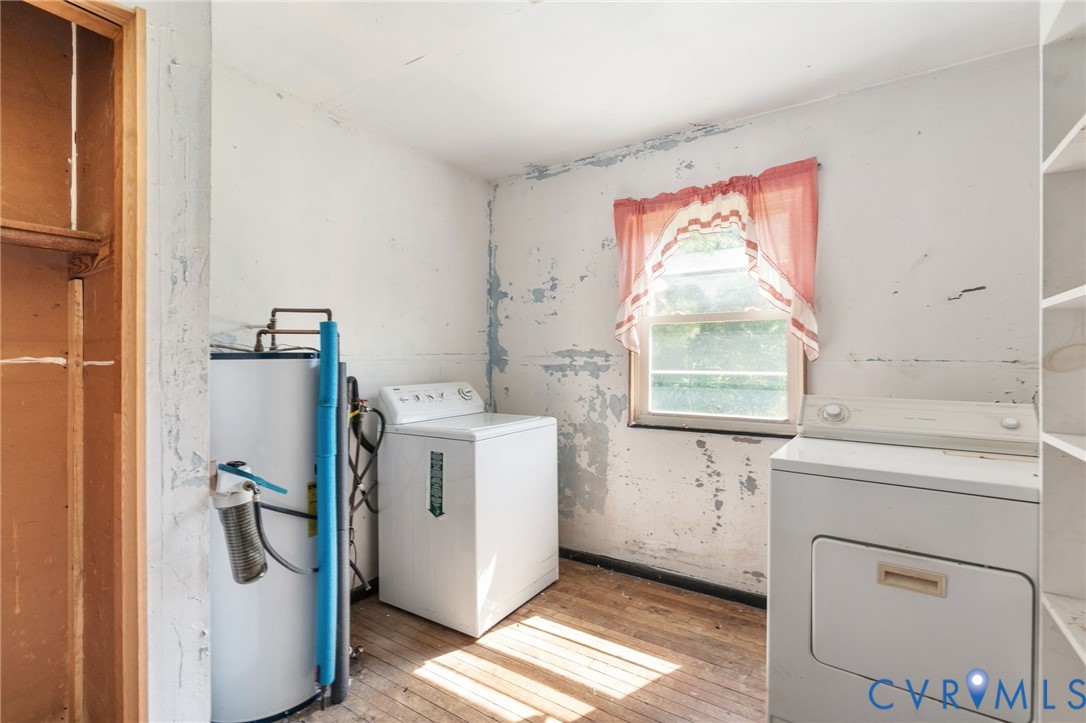3490 Willow Brook Road Bumpass, VA 23024 - Photo 46 of 47 a utility room with closet dryer and washer