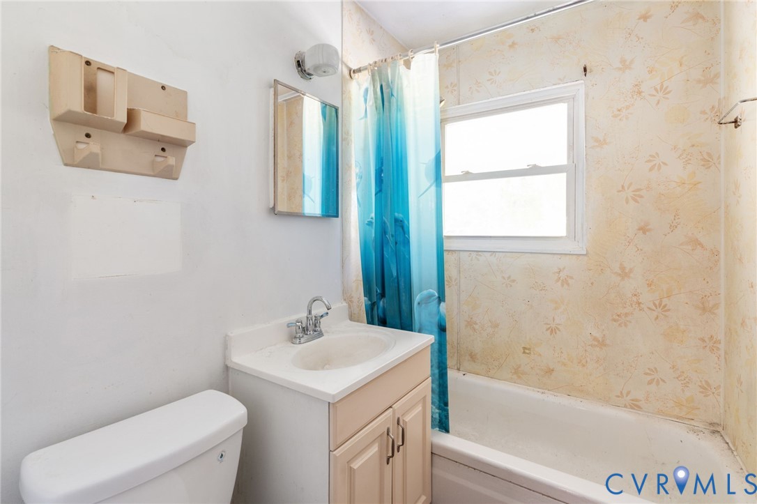 3490 Willow Brook Road Bumpass, VA 23024 - Photo 47 of 47 a bathroom with a sink toilet and shower