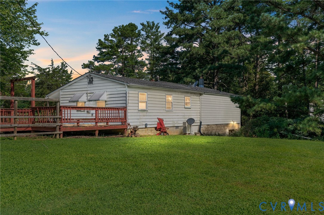 3490 Willow Brook Road Bumpass, VA 23024 - Photo 7 of 47 a view of a house with a backyard