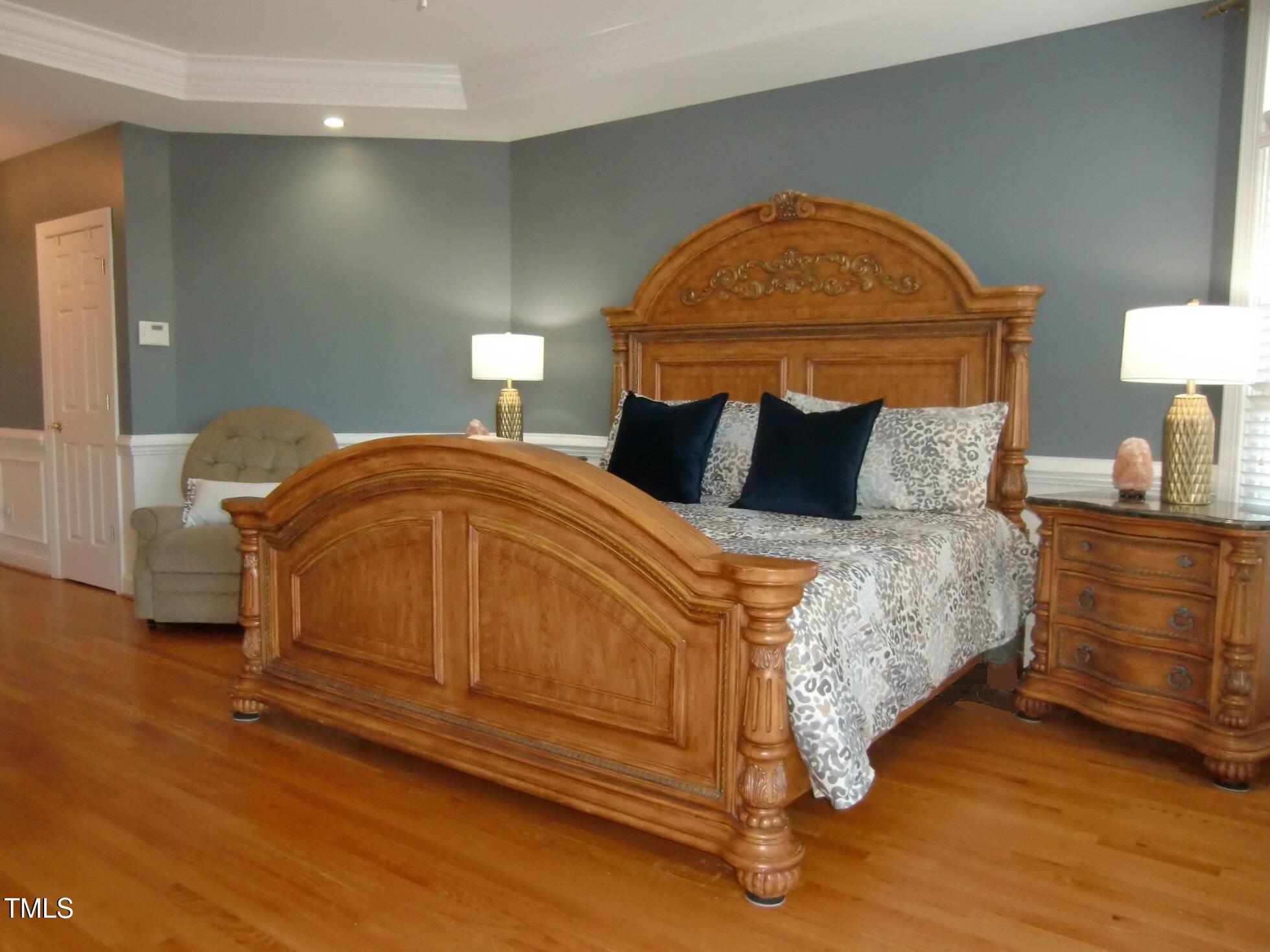 325 Sandy Ridge Road Dunn, NC 28334 - Photo 52 of 97 Spacious 1ST Floor Owner's Suite. King Size Bed in Photo