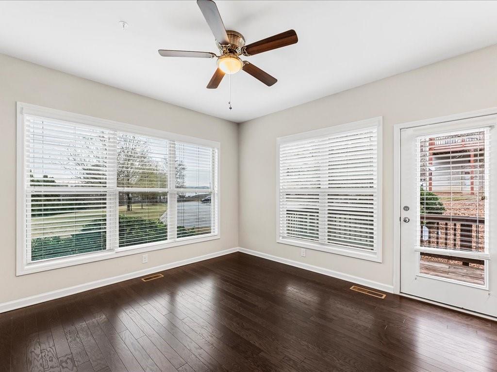 365 Williamson Street Southeast Marietta, GA 30060 - Photo 17 of 28 a view of an empty room with wooden floor and a window