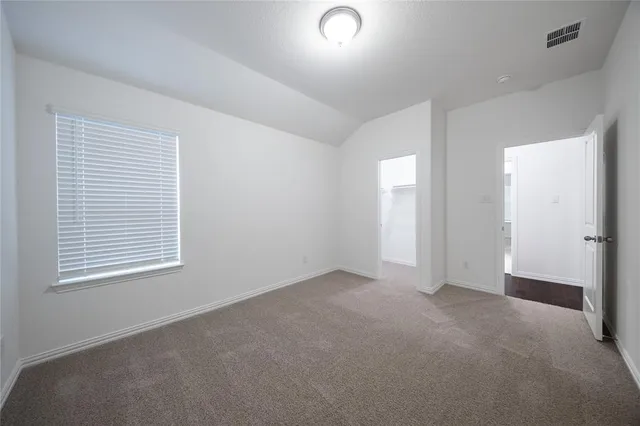 a bathroom with a sink double vanity and a mirror