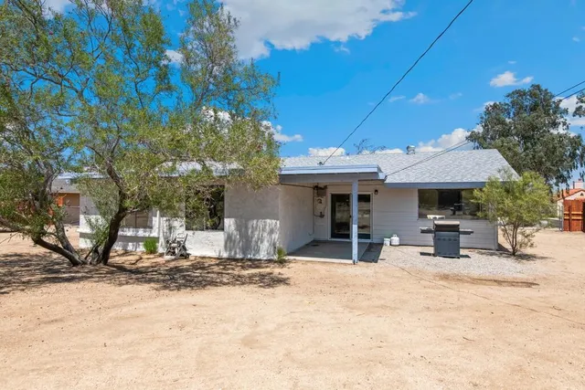 a view of a chairs and tables in the patio