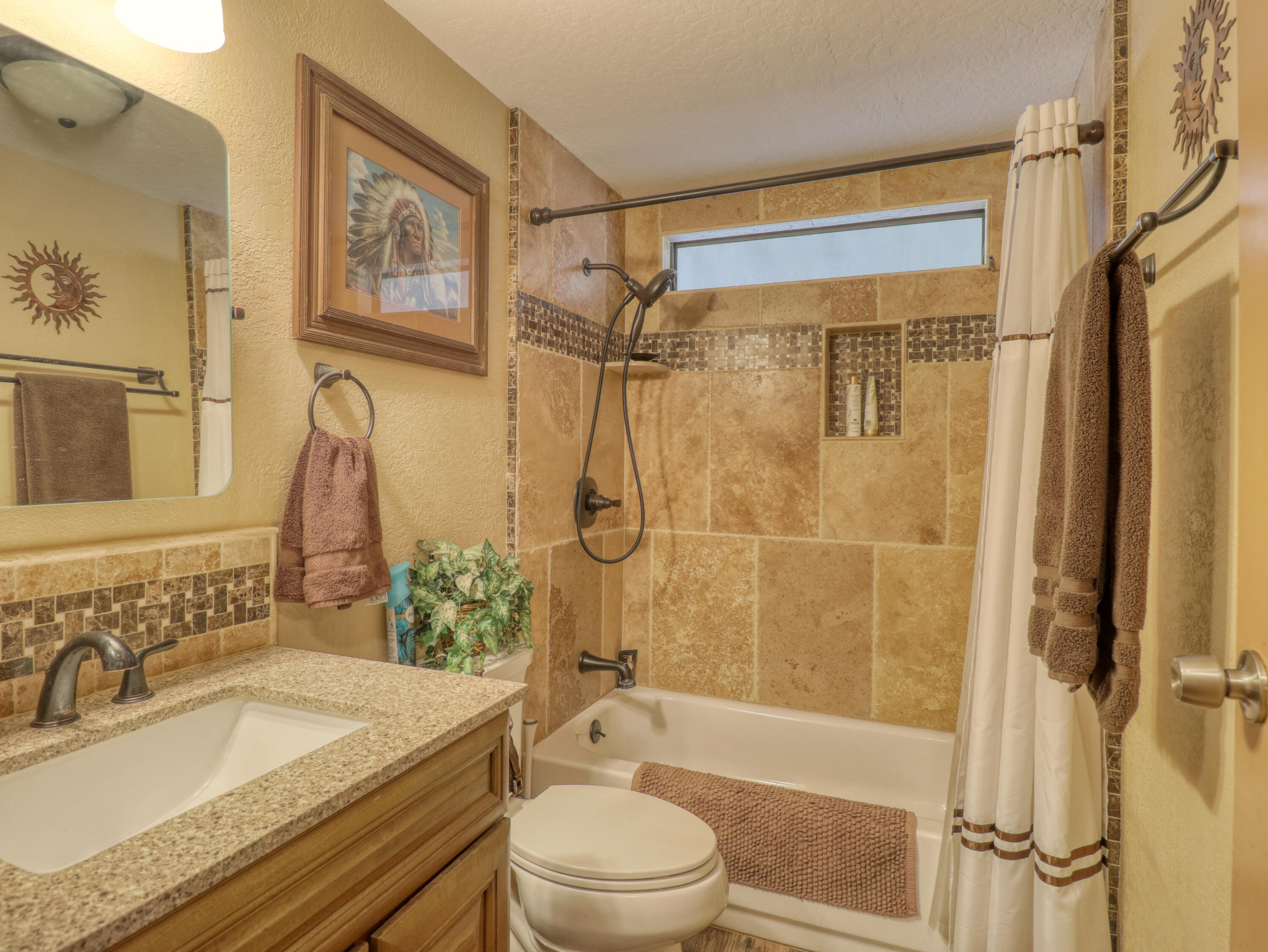 46618 Madison Street, Unit 24 Indio, CA 92201 - Photo 13 of 22 a bathroom with a sink toilet and shower