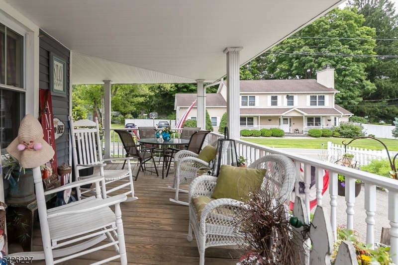 36 Main Street Flanders, NJ 07836 - Photo 46 of 49 a view of balcony with furniture and garden