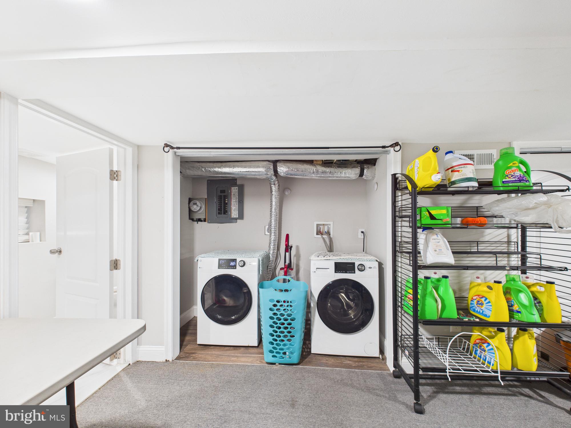 1526 North Patterson Park Avenue Baltimore, MD 21213 - Photo 22 of 31 a utility room with dryer and washer