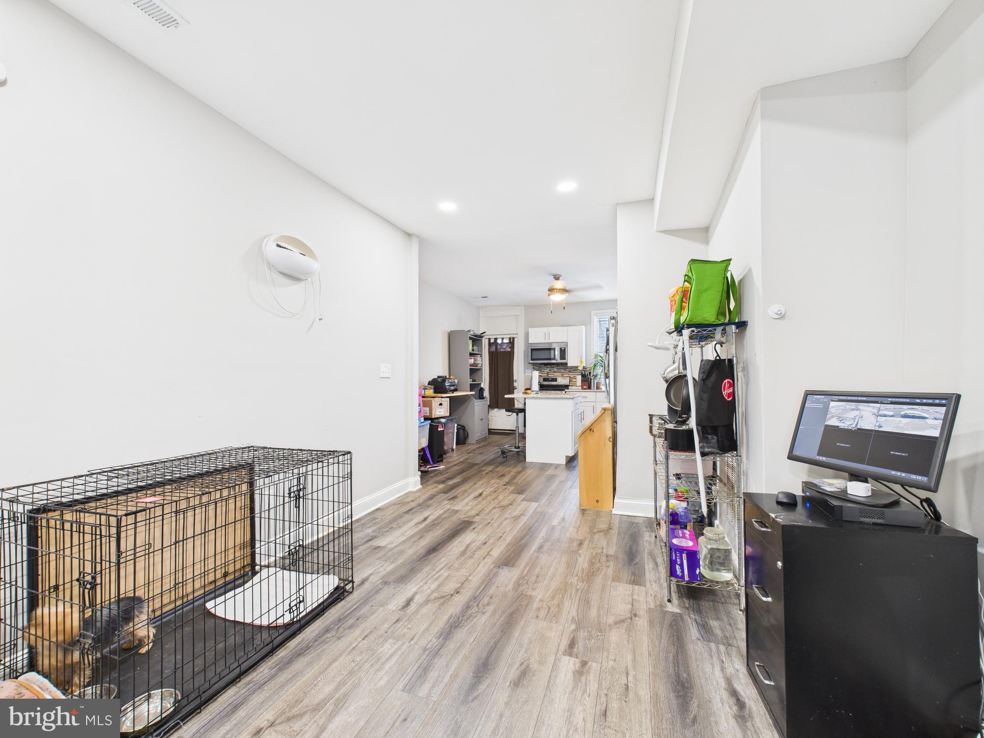 1526 North Patterson Park Avenue Baltimore, MD 21213 - Photo 24 of 31 a living room with furniture and wooden floor