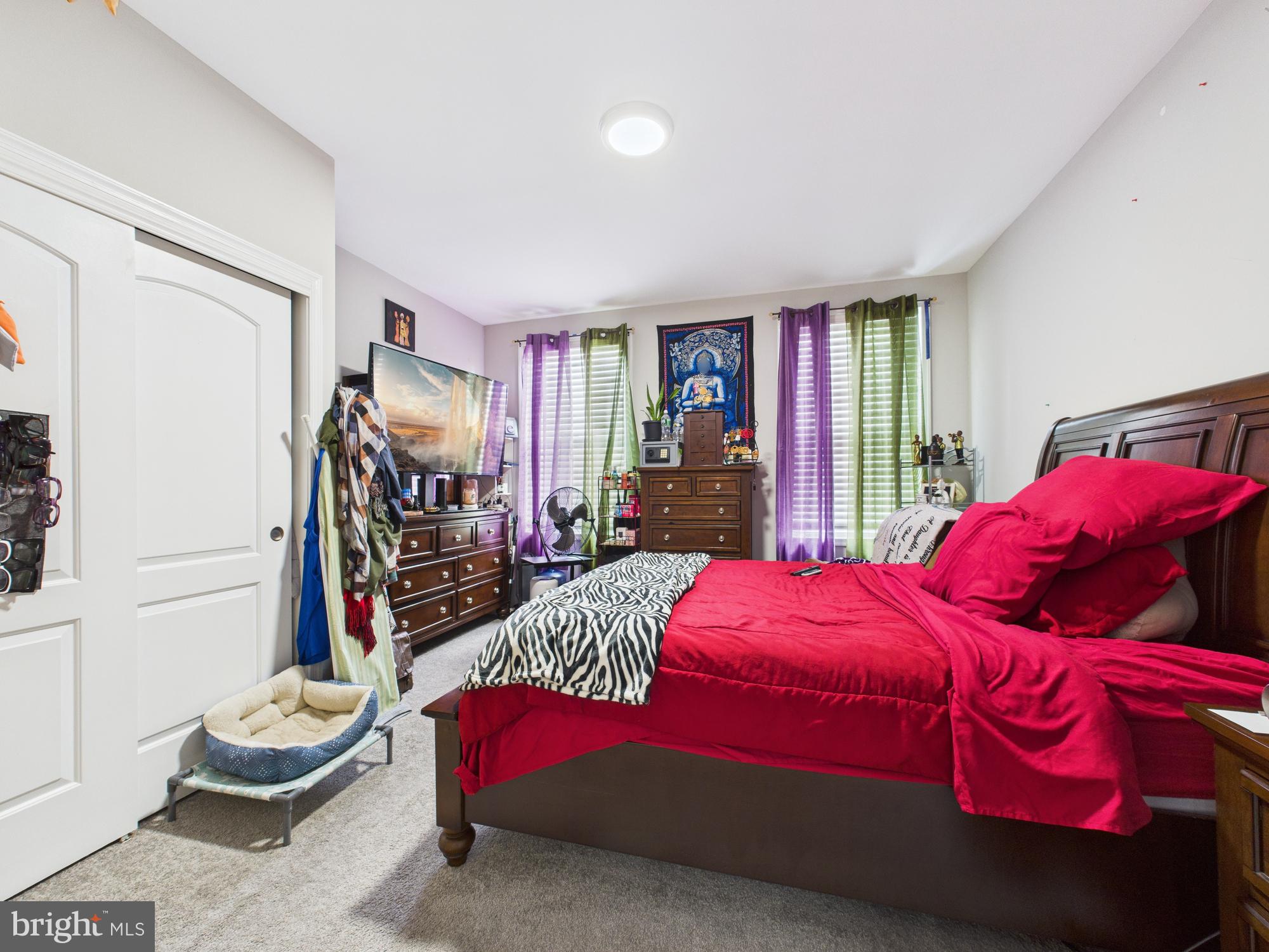 1526 North Patterson Park Avenue Baltimore, MD 21213 - Photo 4 of 31 a bedroom with a bed and closet