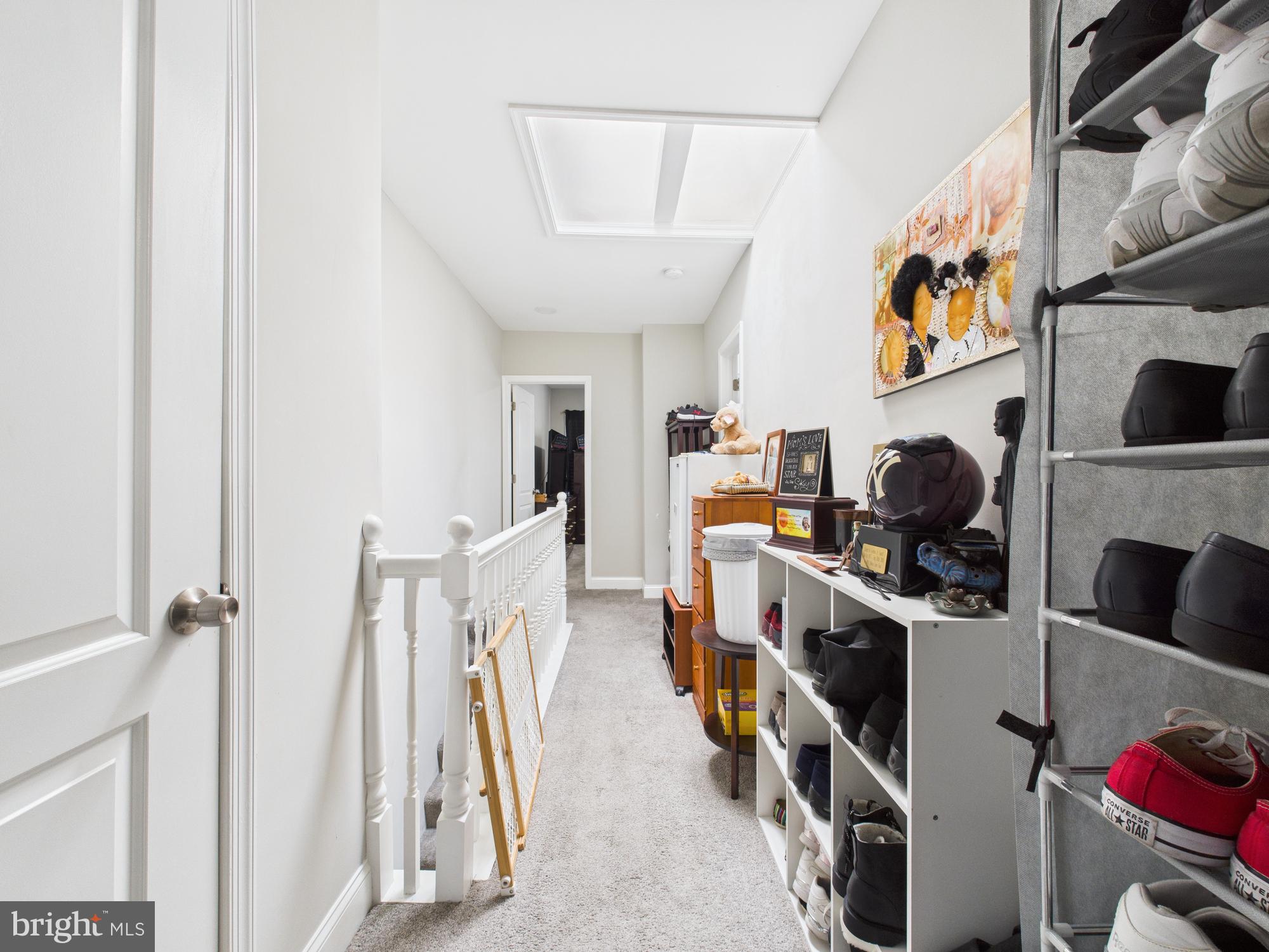 1526 North Patterson Park Avenue Baltimore, MD 21213 - Photo 9 of 31 a view of a workspace with furniture and a fireplace