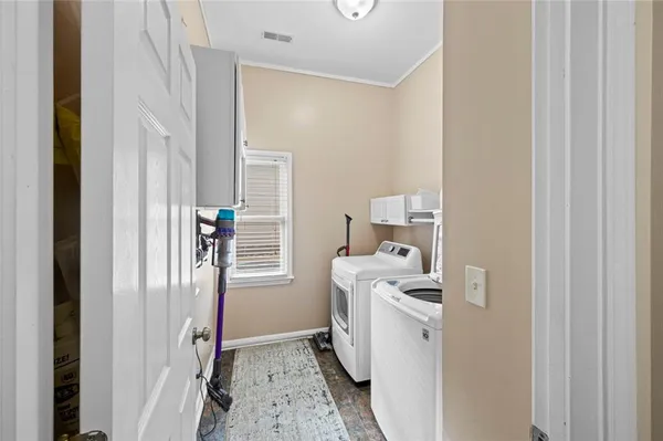 a room with a washer and dryer