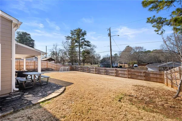 a view of a house with swimming pool