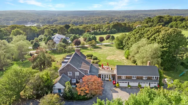 an aerial view of residential house with outdoor space