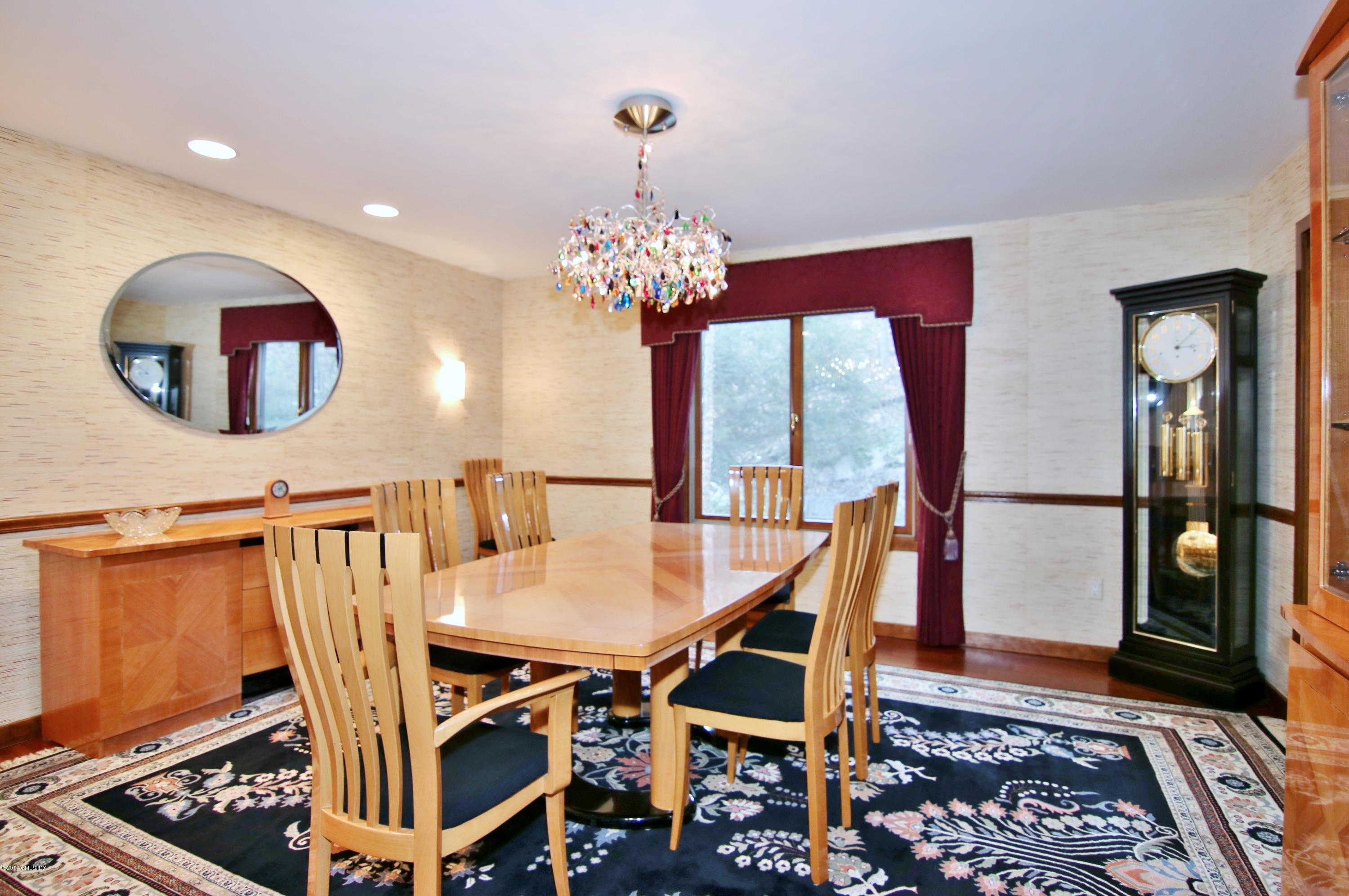 737 Rock Rimmon Road Stamford, CT 06903 - Photo 10 of 38 a view of a dining room with furniture and window