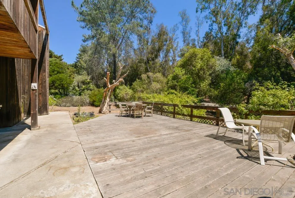 4954 Sun Valley Road Del Mar, CA 92014 - Photo 14 of 32 a view of a patio with swimming pool