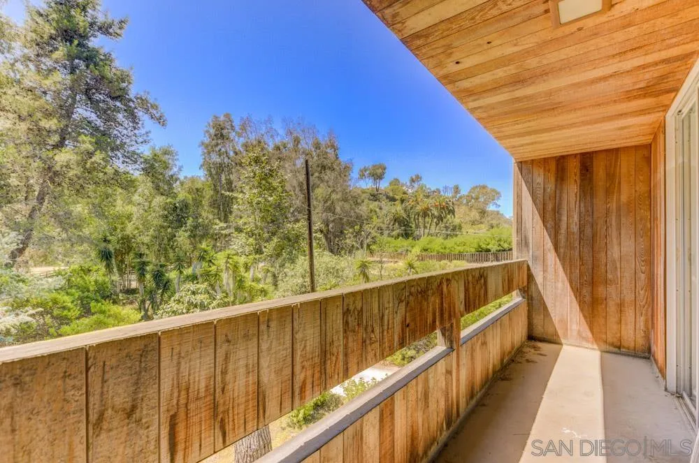 4954 Sun Valley Road Del Mar, CA 92014 - Photo 19 of 32 a view of a balcony with trees
