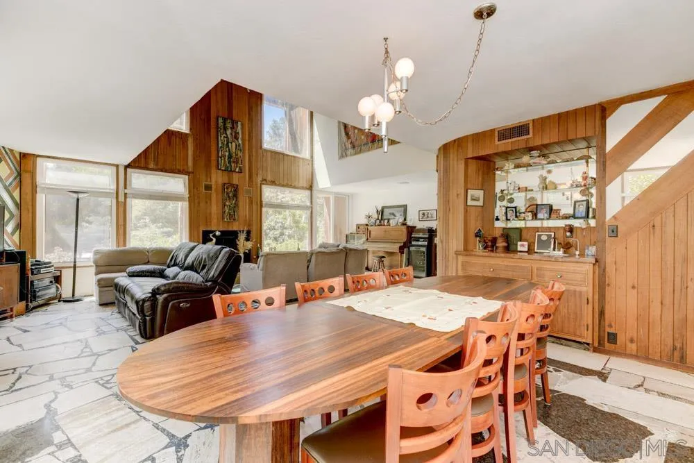 4954 Sun Valley Road Del Mar, CA 92014 - Photo 5 of 32 a view of a dining room with furniture