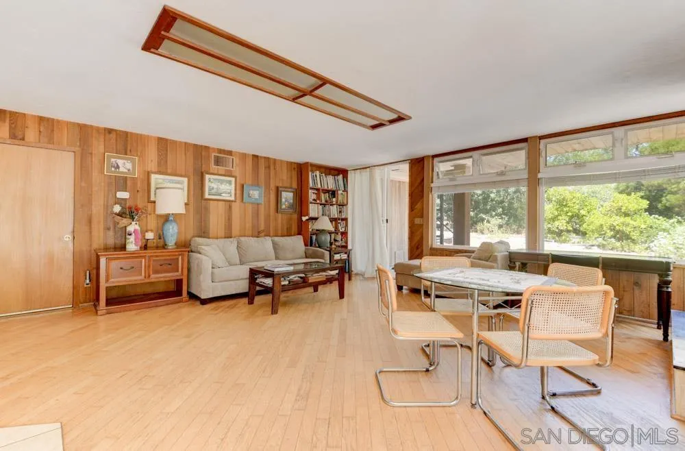 4954 Sun Valley Road Del Mar, CA 92014 - Photo 10 of 32 a living room with furniture and a large window