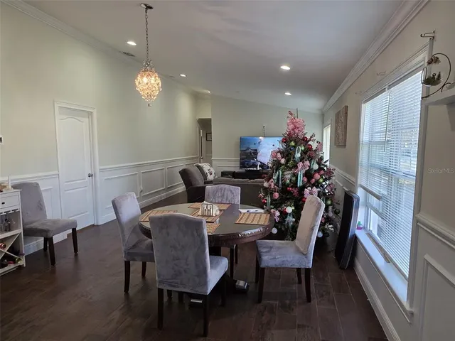 a kitchen with a sink and a stove top oven