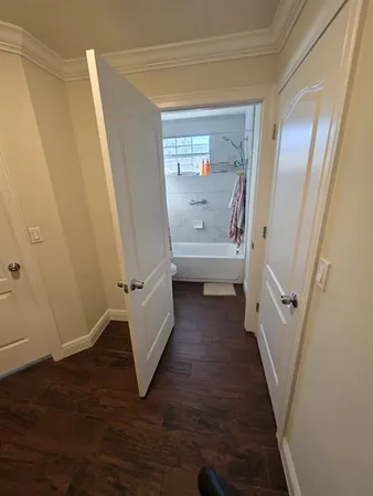a bathroom with a toilet a sink and a mirror
