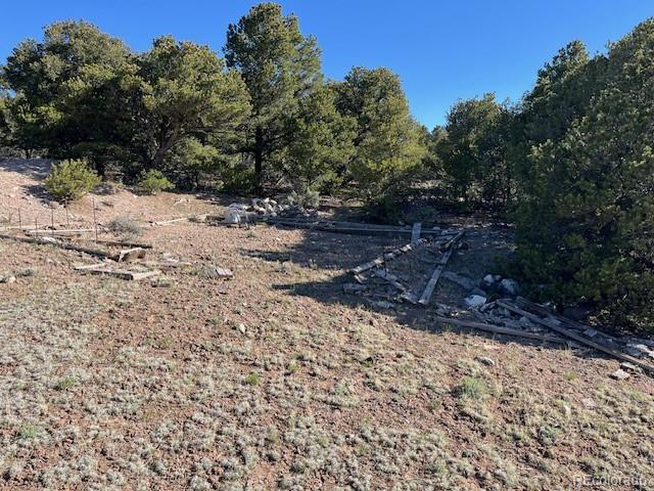 4 Elk Park Road San Luis, CO 81152 - Photo 9 of 30 a view of a yard covered with snow in the yard