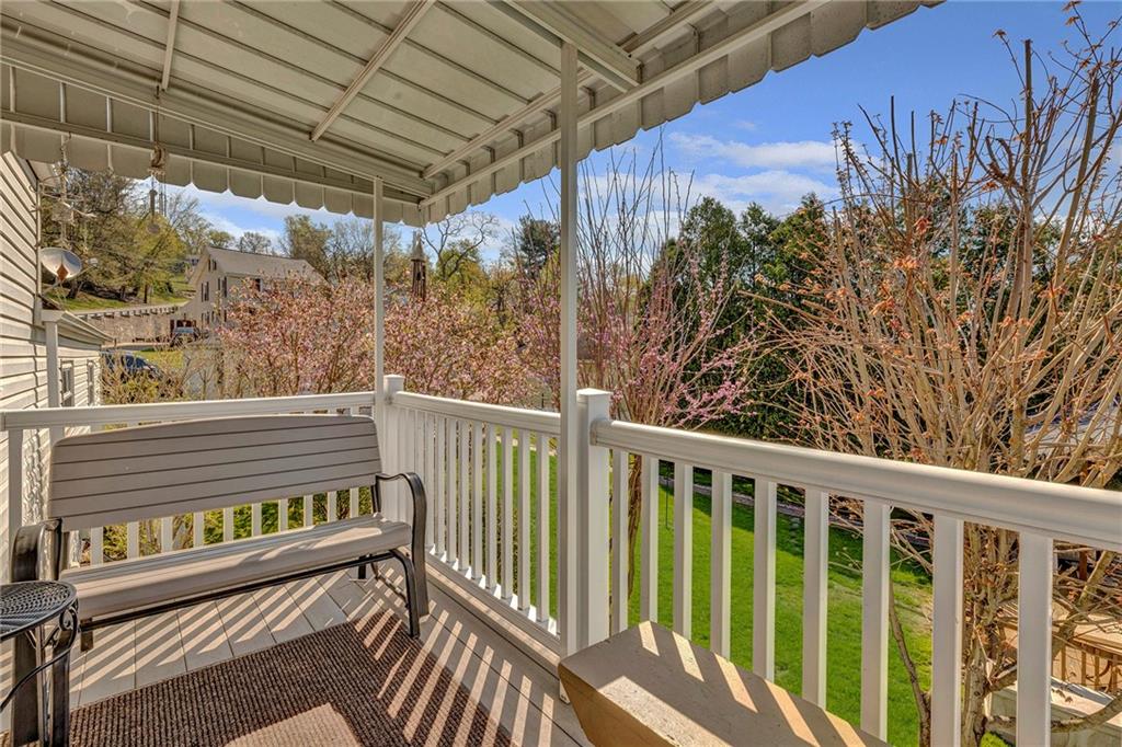 754 Wolf Avenue Rochester, PA 15074 - Photo 21 of 25 a view of a wooden bench in a balcony