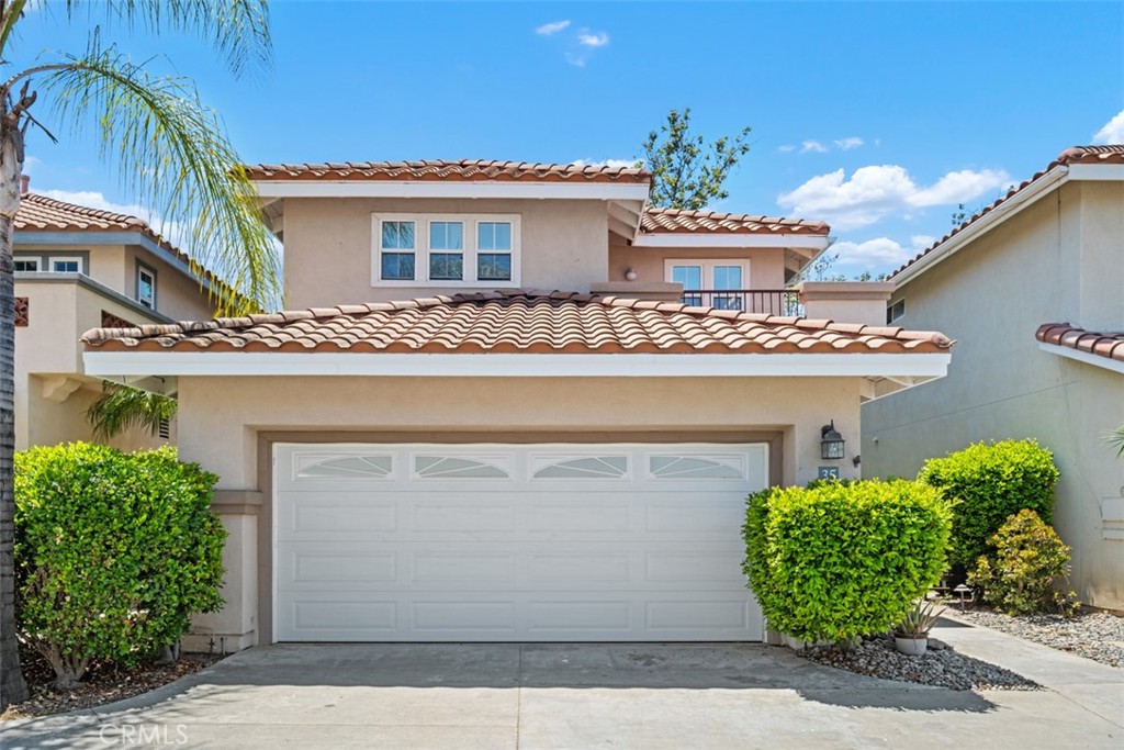 35 Vía Encanto Rancho Santa Margarita, CA 92688 - Photo 2 of 40 a front view of a house