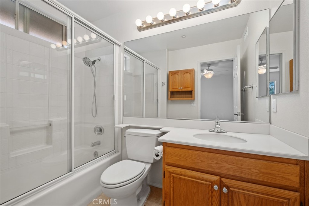 35 Vía Encanto Rancho Santa Margarita, CA 92688 - Photo 31 of 40 a bathroom with a sink a toilet and shower