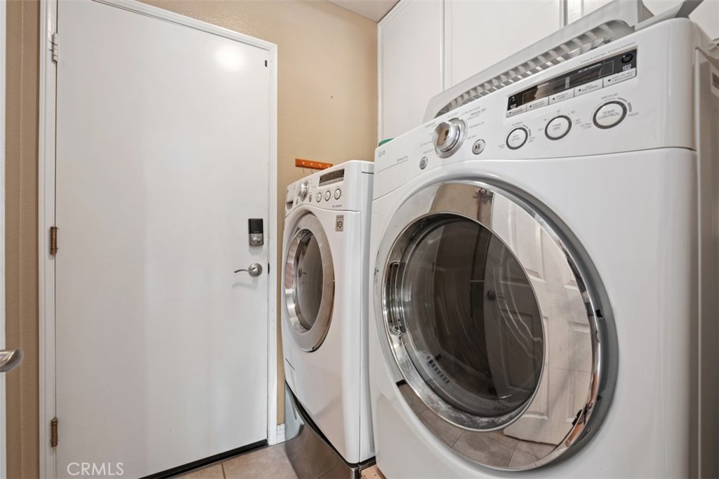 35 Vía Encanto Rancho Santa Margarita, CA 92688 - Photo 32 of 40 a utility room with dryer and washer