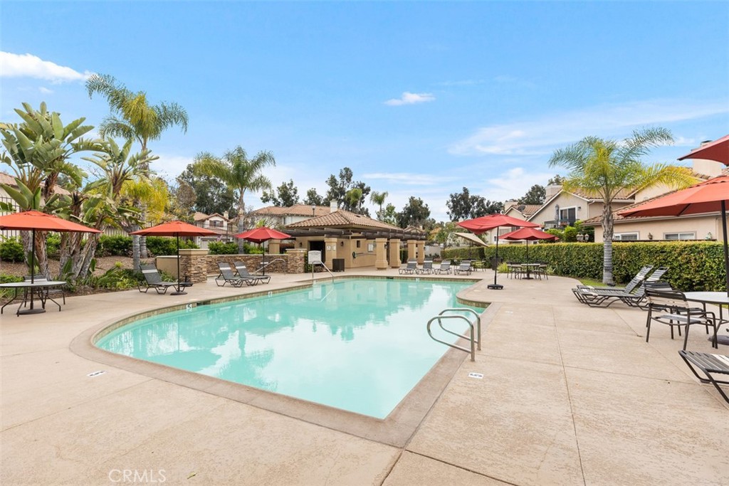 35 Vía Encanto Rancho Santa Margarita, CA 92688 - Photo 33 of 40 a view of swimming pool with outdoor seating and plants