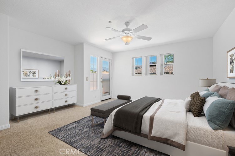 35 Vía Encanto Rancho Santa Margarita, CA 92688 - Photo 39 of 40 a bedroom with a bed and a chandelier