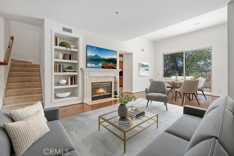 35 Vía Encanto Rancho Santa Margarita, CA 92688 - Photo 40 of 40 a living room with furniture and a fireplace