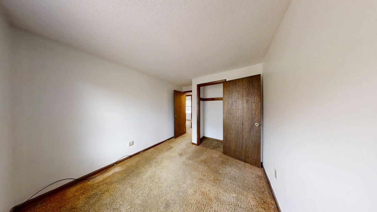 765 Millstone Road Brewster, MA 02631 - Photo 5 of 16 a view of an empty room and window