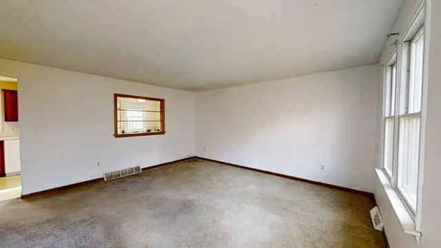 an empty room with a window