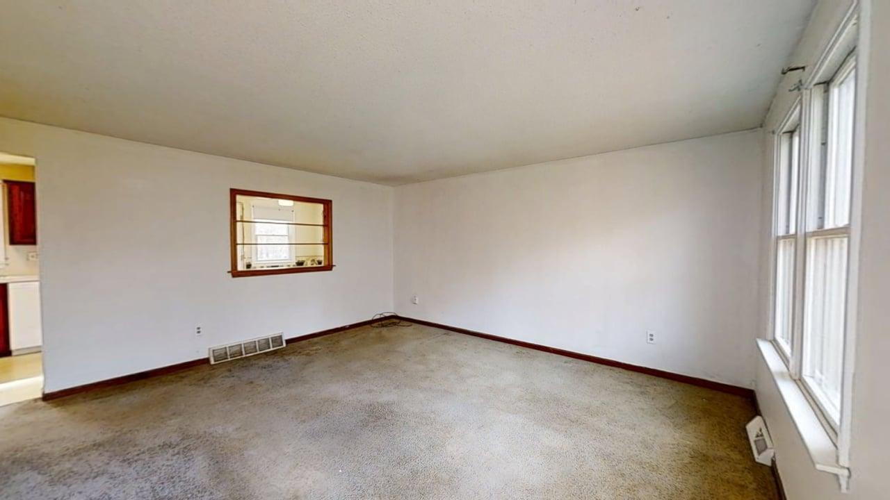 765 Millstone Road Brewster, MA 02631 - Photo 6 of 16 an empty room with a window